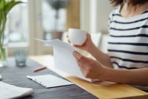 woman reading a form